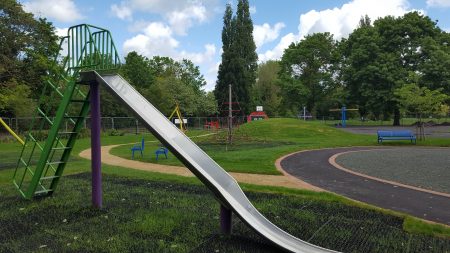 Tall playground slide, Climbing Net, Grass mounds